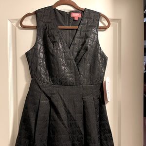 Black pleated quilted dress